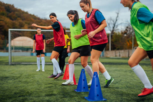 istock Female soccer team in HIIT exercise. 1489247303