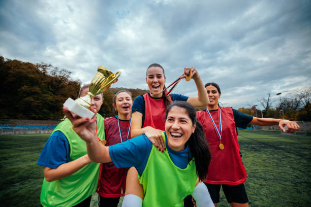 istock Female soccer team victory celebration. 1489247843