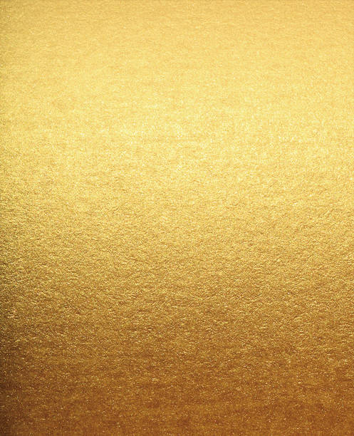 istock Gold foil leaf shiny paper texture background 1489250461