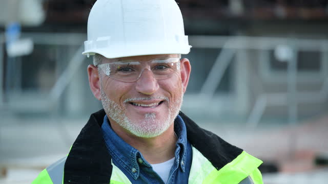 Mature Hispanic man working at construction site