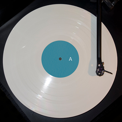 Record player with white vinyl record