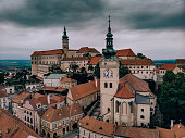 Landscape photo of Mikulov, Moravia, Czech Republic. View from air, drone photography. Beautiful old architecture, picture of red rooftop, downtown district.