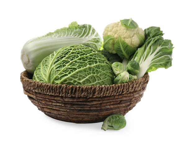 istock Wicker bowl with different types of fresh cabbage on white background 1489262034