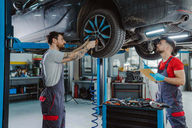 istock Auto mechanics working at the car service 1489262077