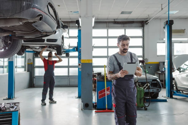 istock Automotive technicians at the service station 1489263123