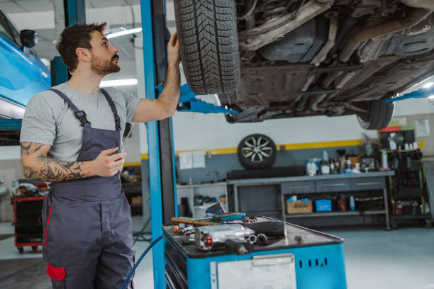 istock Auto mechanic working at car service 1489263315
