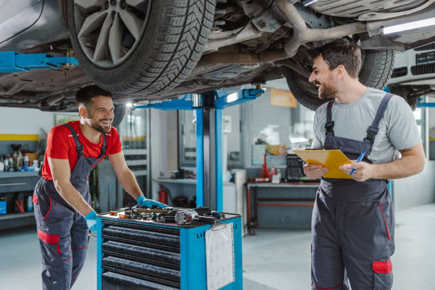 istock Auto mechanics working at the car service 1489263329