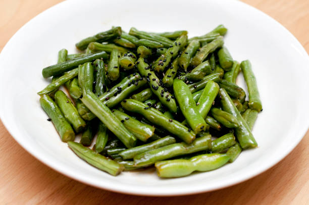 istock Stir-fried green beans and sesame seeds 1489266355