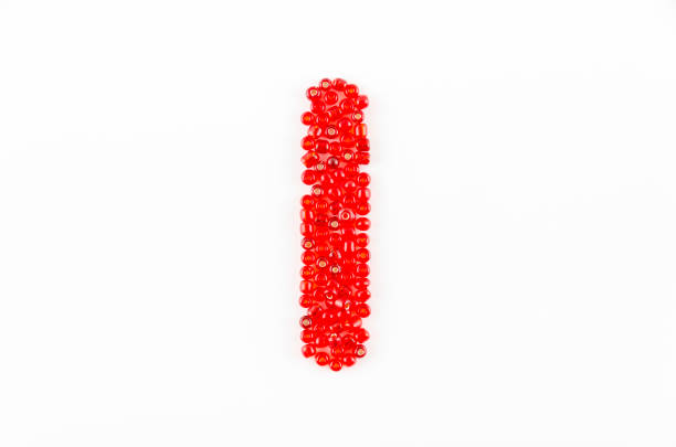 Alphabet of red beads on white background I