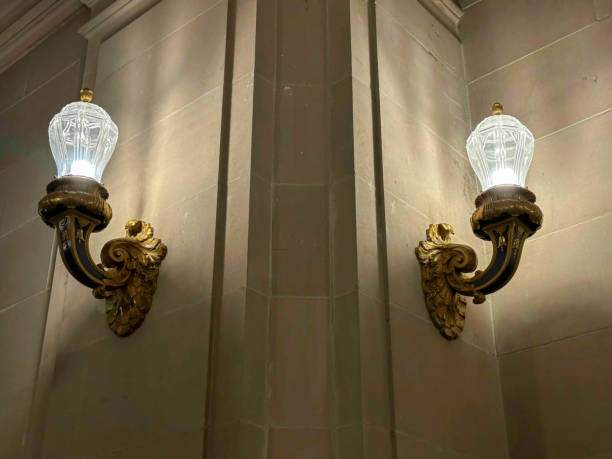 istock Two light fixtures and attached to a marble wall 1489268982