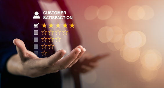 Satisfaction, Feedback and Customer service Concept, Man give 5 stars with survey check box and excellent experience rating review