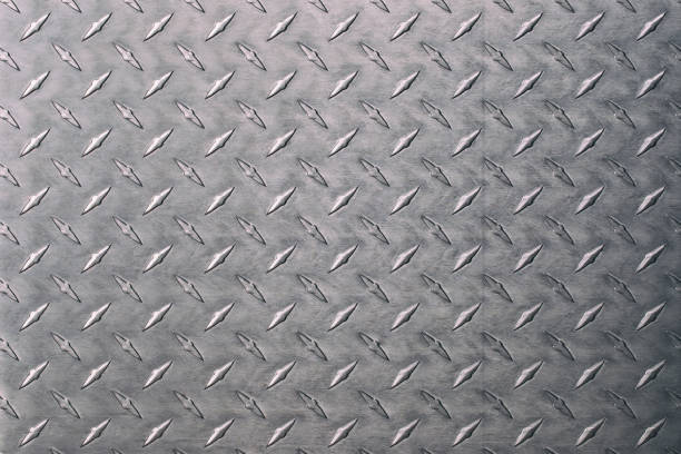 gray metal background, shiny iron texture with diamonds