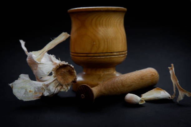 Garlic and wood garlic press
