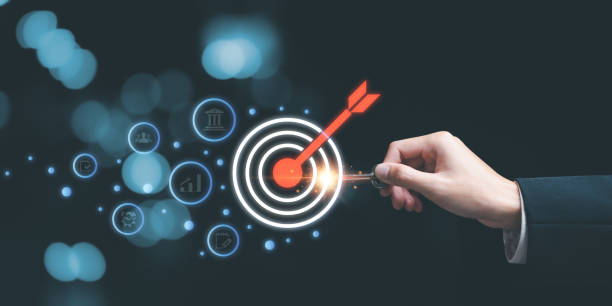 istock businessman showing business goal setting concept ,focused concepts , Target Growth development planning ,Organizational growth and objectives , marketing strategy planning ,Target customers 1489314729