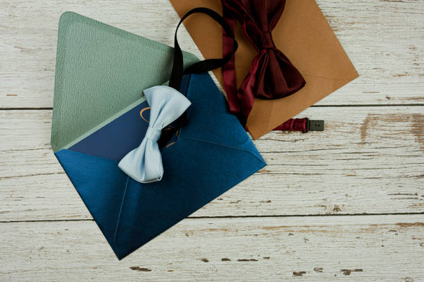 istock Elegant wedding stationery set with bow tie and a wedding invitation. 1489326764
