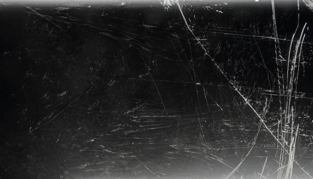 istock Broken Glass Texture with Shattered Aged Window and Dust Scratches, Providing a Grungy Abstract Wallpaper, Abstract Background, Rough Brush Strokes, Backgrounds, Versatile Wallpaper, 1489328914