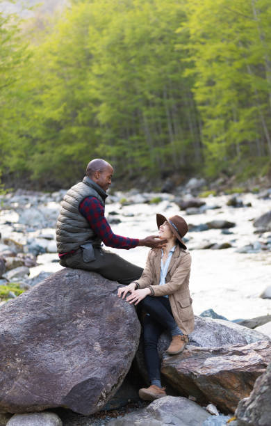 istock A loving multi race heterosexual couple spending time together in nature 1489330271