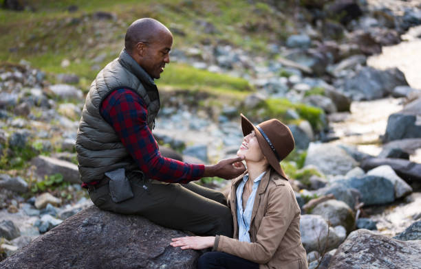 istock A loving multi race heterosexual couple spending time together in nature 1489330281