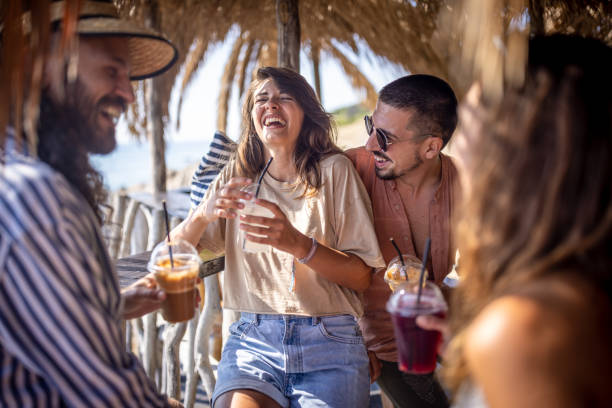 istock Happy friends talking in a beach bar during summer day 1489333663