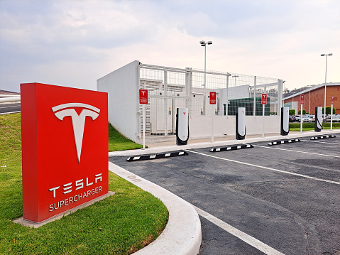 Mexico State, Mexico - May 05 2023: The American electric car company, Tesla begins charging for the use of its Supercharger chargers in Mexico, after offering the service for free