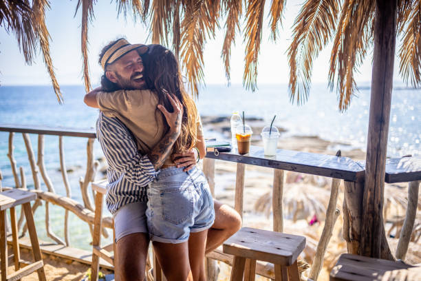 istock Couple in a beach bar 1489335172