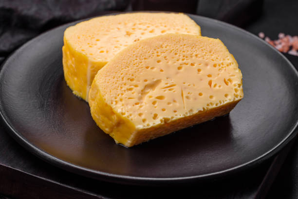 istock Delicious omelet with milk, spices and herbs cut into large pieces 1489337377
