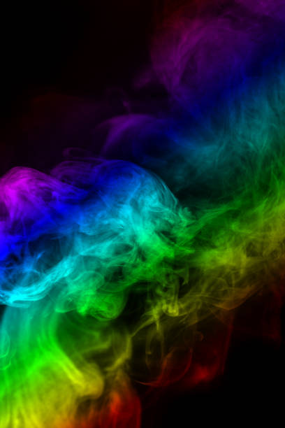 istock Abstract smoke isolated on black background,Rainbow powder 1489339446