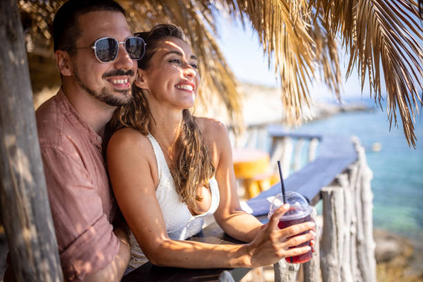 istock Couple in a beach bar 1489340290