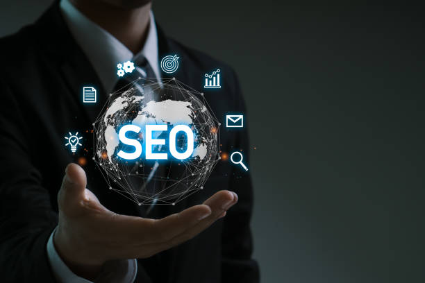 istock SEO,Search Engine Optimization Marketing Ranking Traffic Website Internet Business Technology Concept.Seo Career.Businessman holding global network with SEO icon. 1489341420