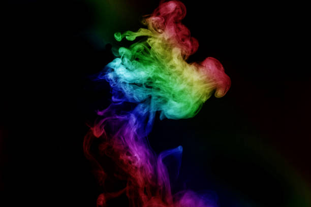 istock Abstract smoke isolated on black background,Rainbow powder 1489342219