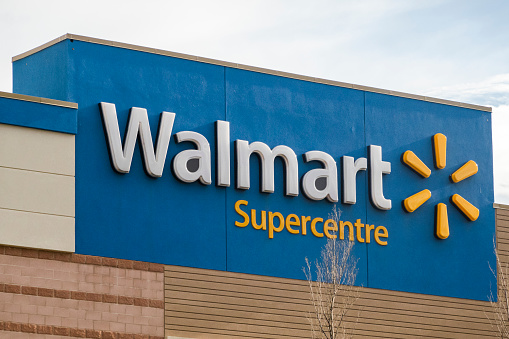 Calgary, Alberta, Canada. May 11, 2023. A Walmart supercentre sign at an entrance.