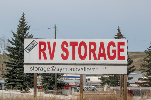 Calgary, Alberta, Canada. May 11, 2023. A RV storage facility sign.
