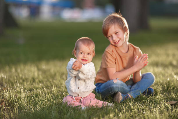 istock Happy siblings enjoying in nature 1489351992