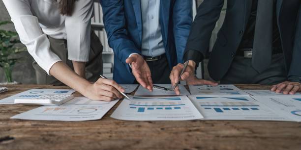 istock Business team collaboration discussing working analyzing with financial data and marketing growth report graph in team, presentation and brainstorming to strategy planning making profit of company 1489359551