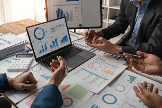 Business team meeting , collaboration discussing working analyzing with financial data and marketing business strategy project, presentation and brainstorming to making profit of company