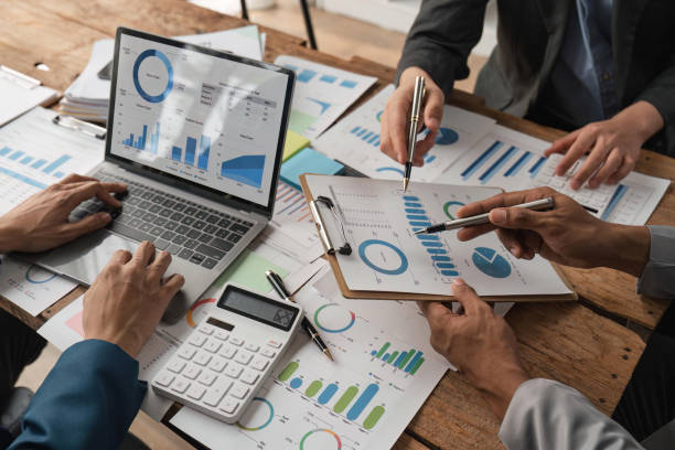 istock Business team collaboration discussing working analyzing with financial data and marketing growth report graph in team, presentation and brainstorming to strategy planning making profit of company 1489360203