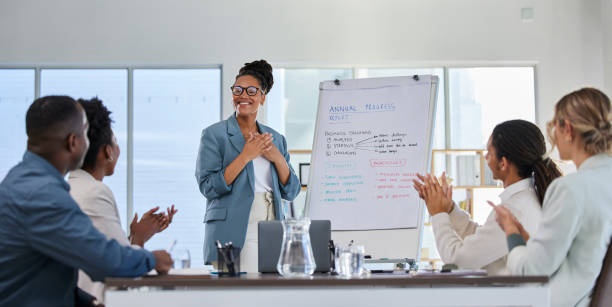 business presentation, proud black woman and office training with success and clapping from crowd. management, conference room and sales team working on a speaker coaching on innovation strategy - training business seminar clapping imagens e fotografias de stock