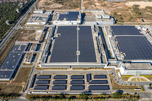Aerial view of a factory using solar power
