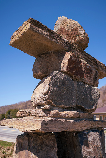 Large rock tower on the hill, Zen like stones, tall and impressive, concepts for traveling on the road searching for inner peace, tranquility, stability, or balance