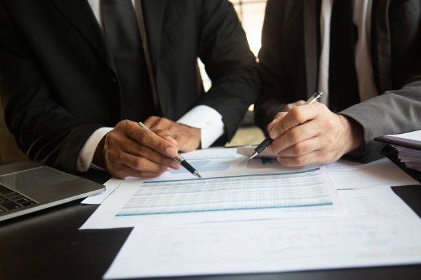 istock Team business man using a laptop in a meeting for discus documents and ideas.concept 1489375502
