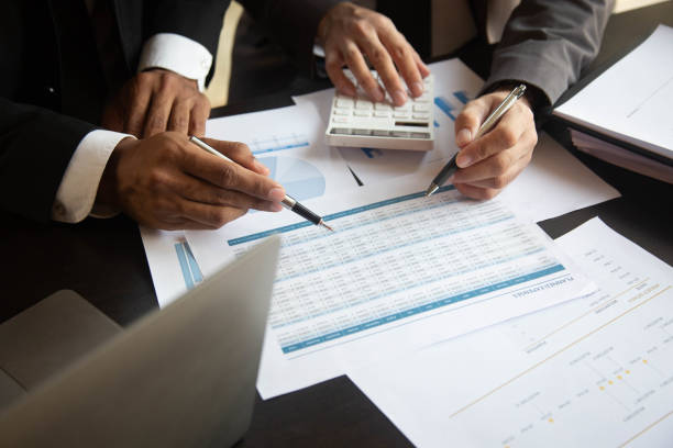 istock Team business man using a laptop in a meeting for discus documents and ideas.concept 1489375534
