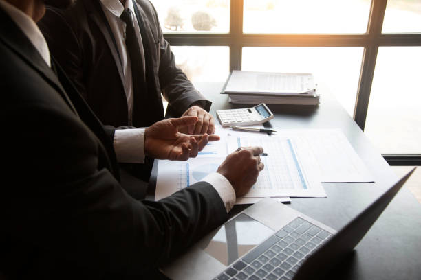 istock Team business man using a laptop in a meeting for discus documents and ideas.concept 1489375572