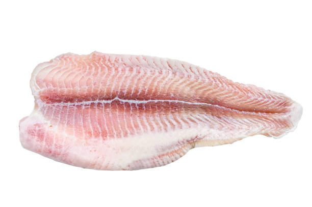 istock Frozen pangasius fish fillet.   Isolated on white background. 1489376029