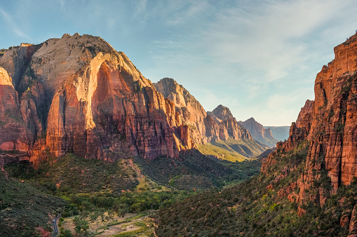 Landscape photo of The Watchman and the North Fork Virgin River at sunset in Zion National Park, Utah, USA.