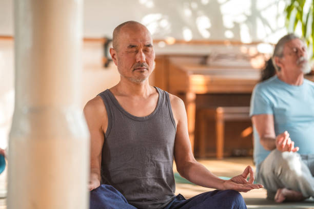 istock Japanese Senior Man Finding Zen in Yoga Studio 1489378339