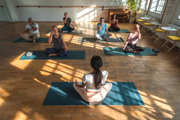 istock Healthy Aging: A Yoga Group of Active Seniors 1489378384