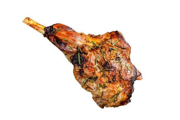 Baked lamb, sheep leg with rosemary.   Isolated on white background