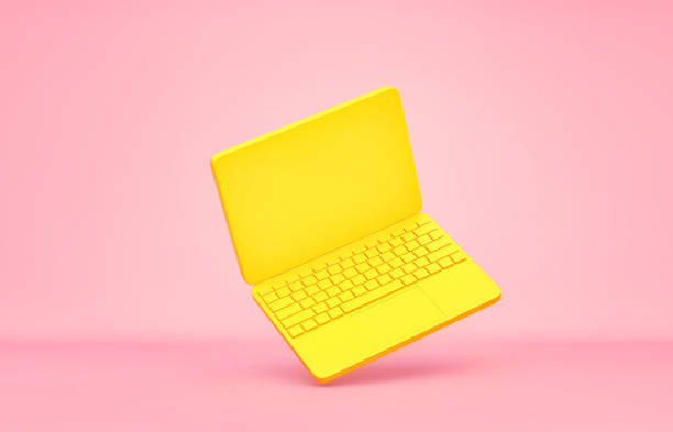 istock Yellow laptop flying on pink background. Clipping path included 1489383552