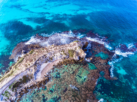 Aerial view of the sea and the ocean looking down on reef in Western Australia.