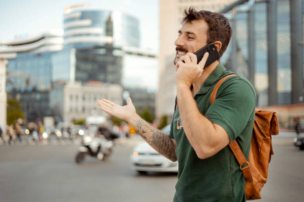 istock Man Talking on Smartphone on the City Street 1489387580